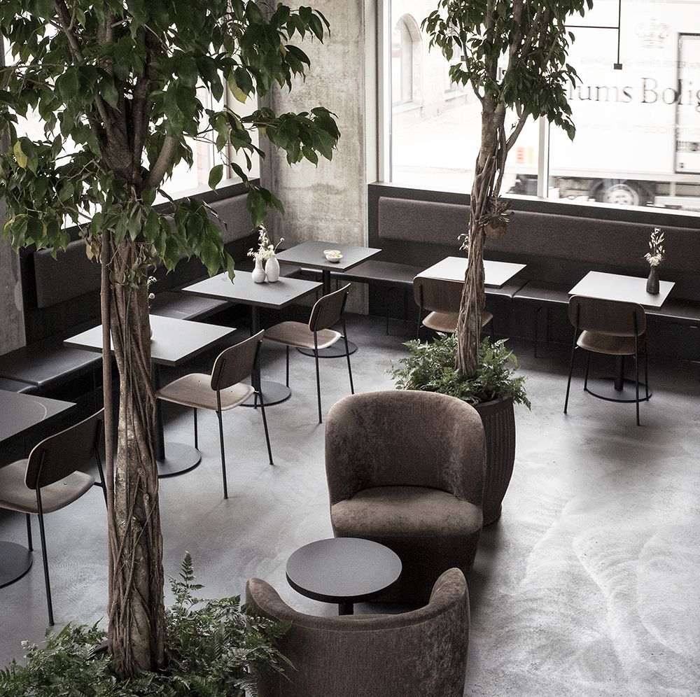 Industrial restaurant with bench seating in Black leather