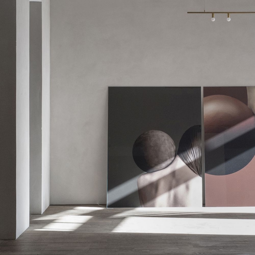 The Kinfolk Gallery featuring large images with models and brown leather balls