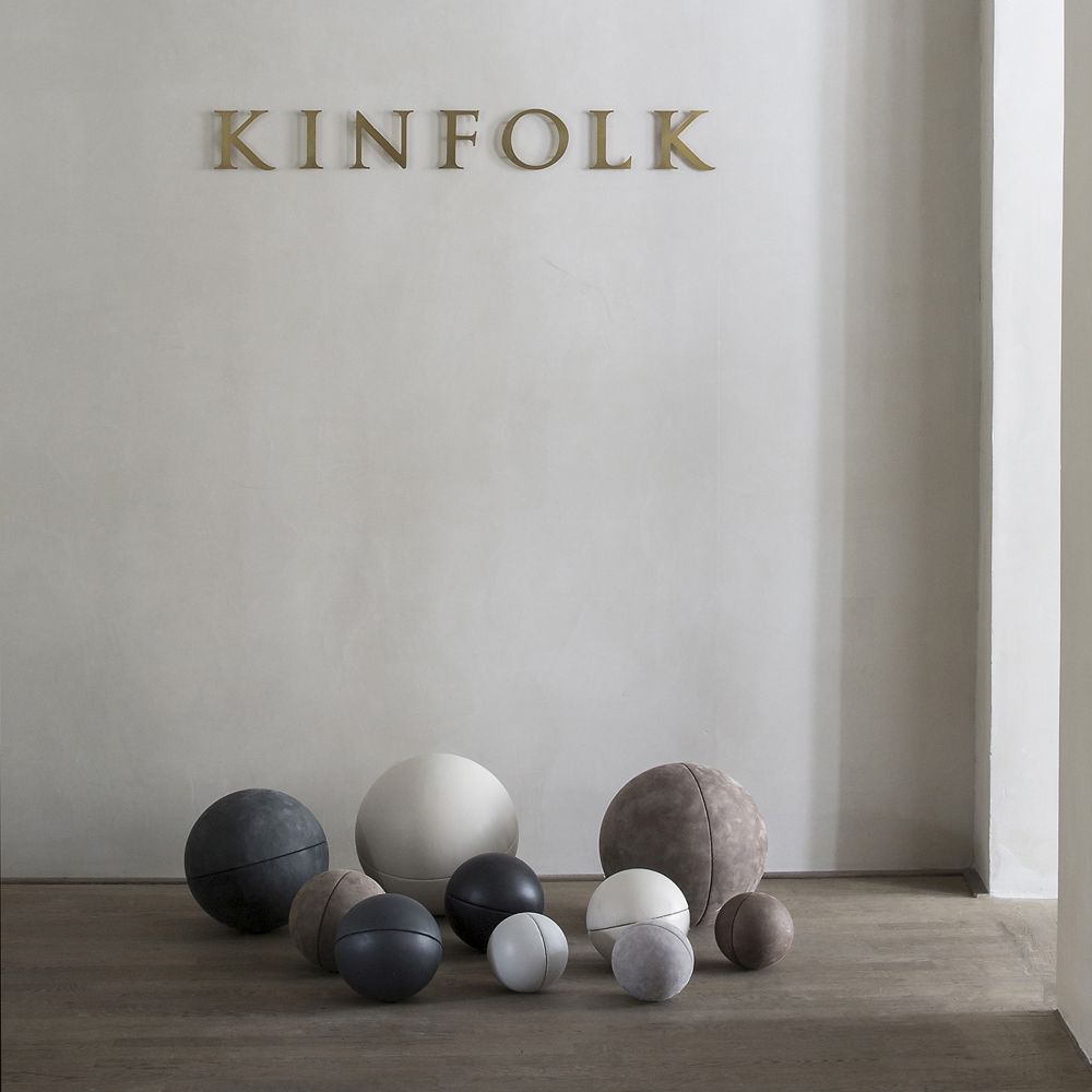 The Kinfolk Gallery with leather balls in different sizes on the floor