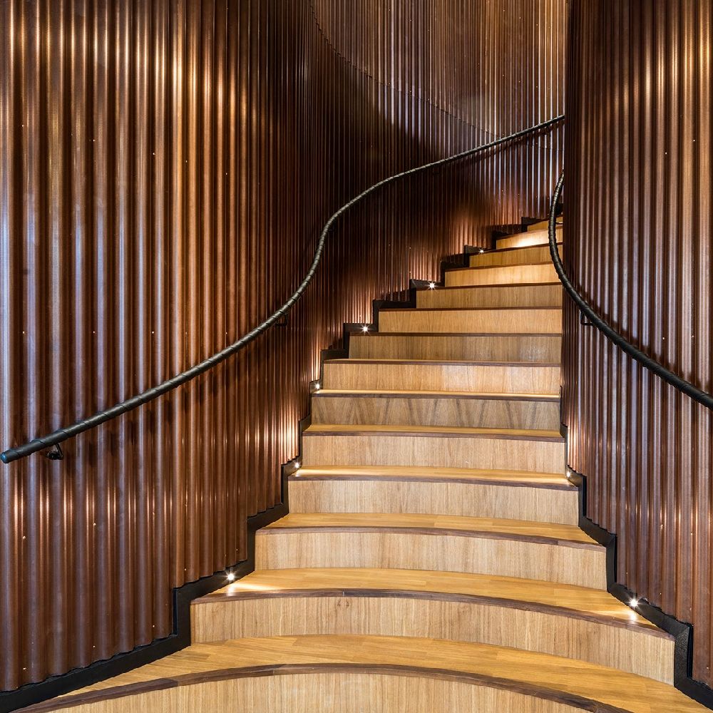 Wooden staircase inside Axel Towers