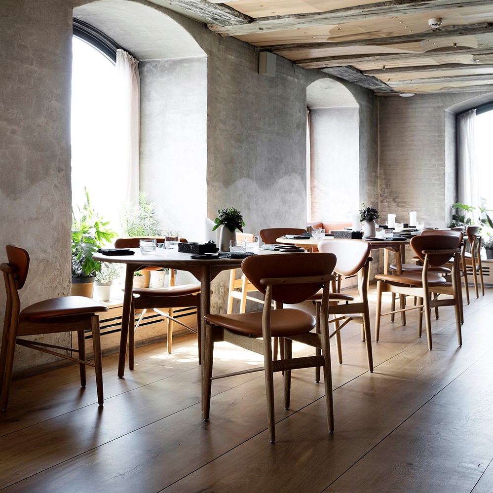 Inside Restaurant BARR. Finn Juhl’s 108 Chairs from House of Finn Juhl crafted with Sørensen Leather.
