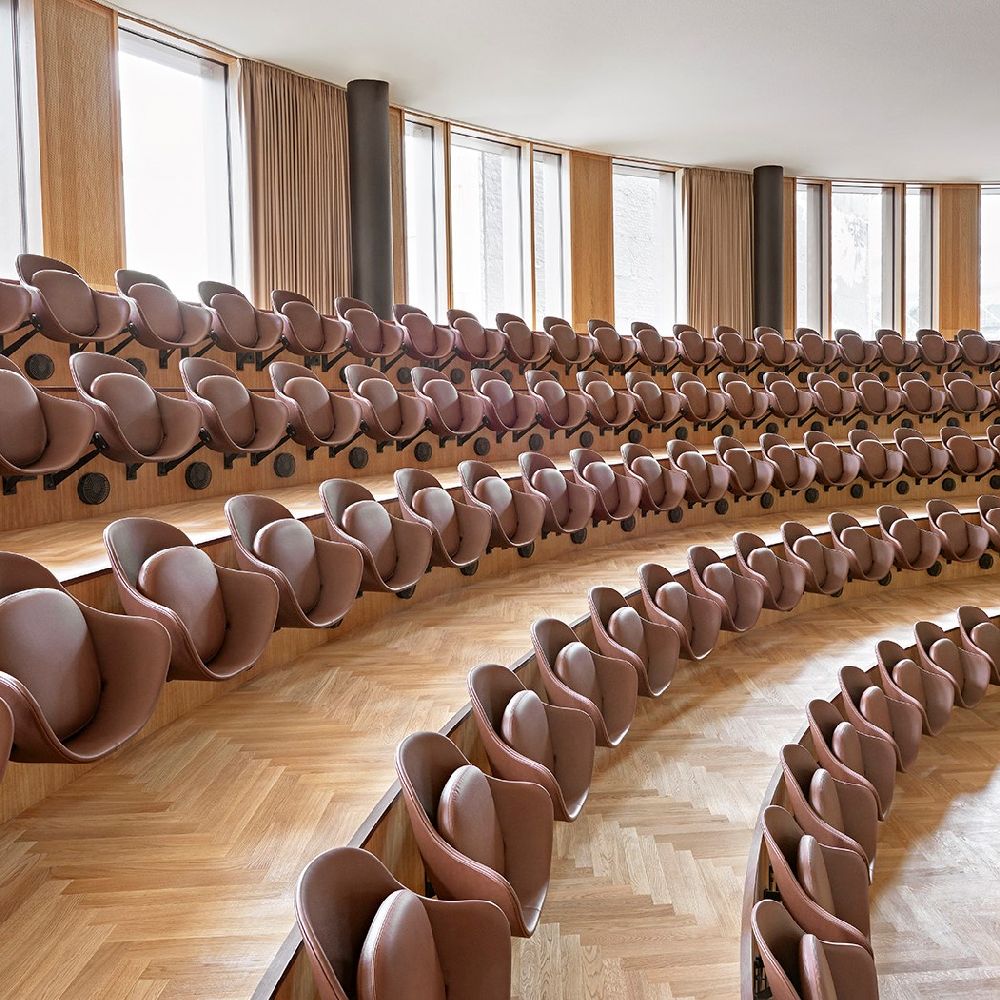 Auditorium inside Axel Towers with seats by Engelbrechts crafted in brown Sørensen Leather.