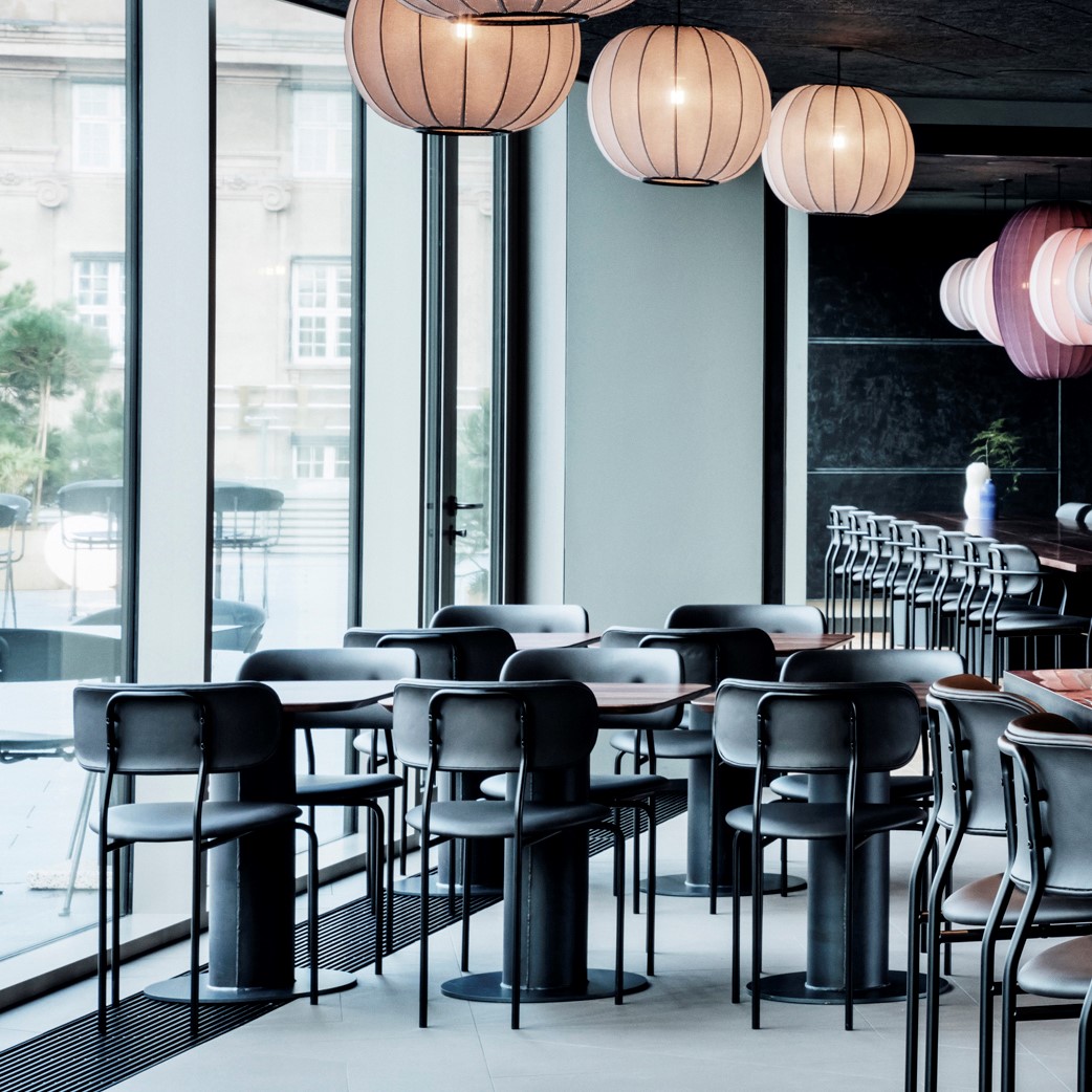 Sticks ‘n’ Sushi restaurant with Le Coco chairs crafted with black Sørensen Leather