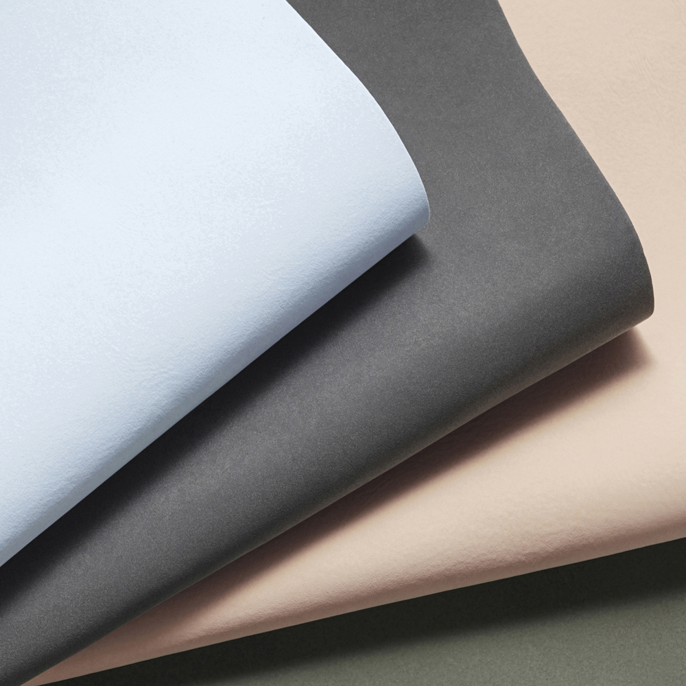 Our FLUX® collection showing Light Blue, Anthrazite, Light Brown and Dark Green